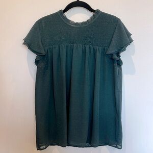 Green polka dot blouse